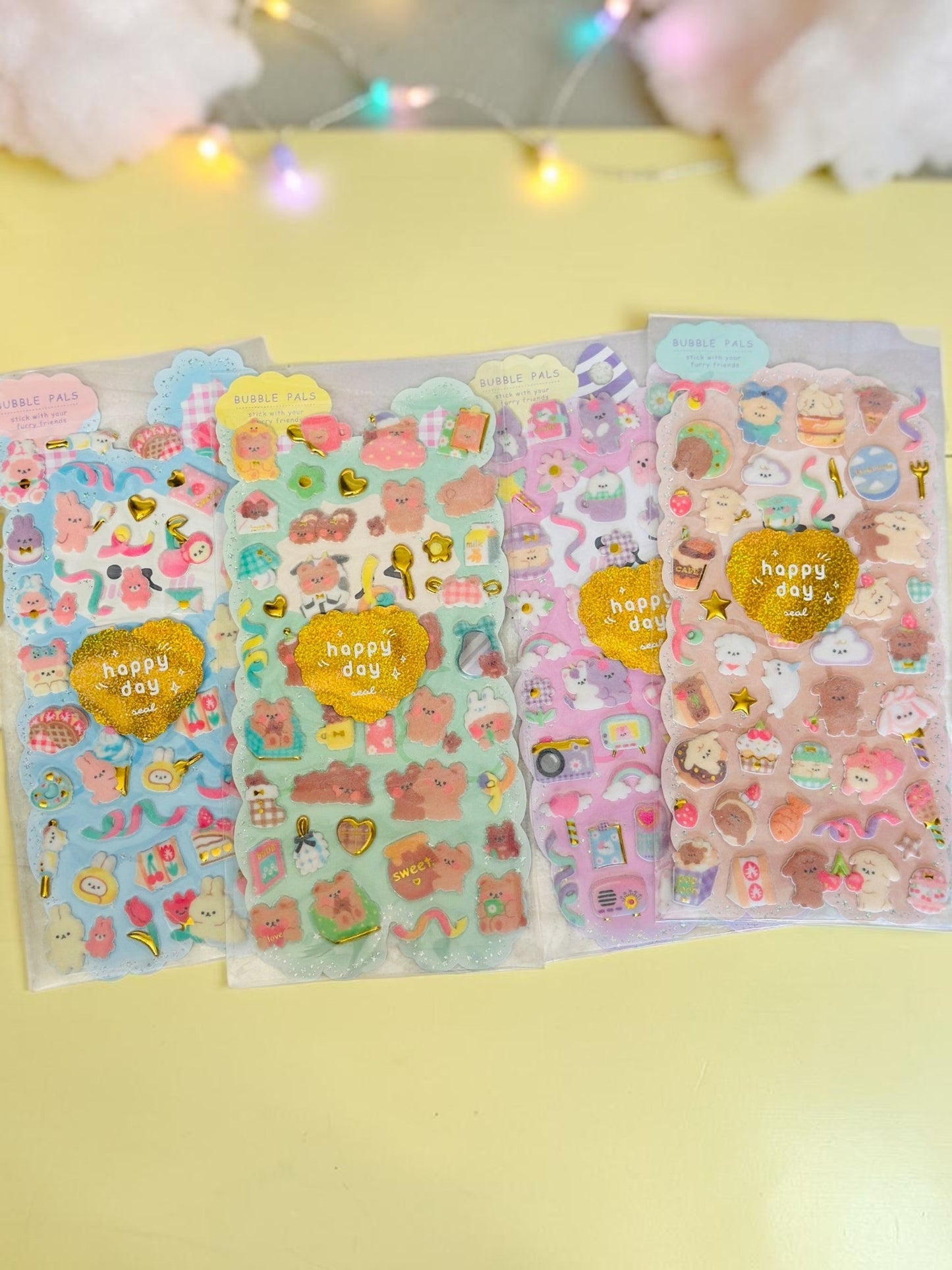 Miso station Bubble Pals puffy sticker sheets with cute animals, sweet treats, and glittery gold heart accents.