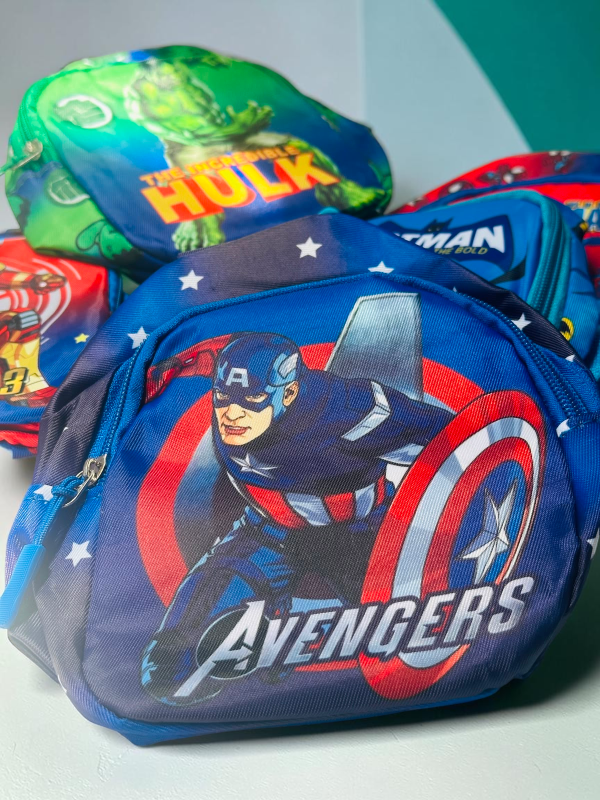 Miso station superhero themed mini backpacks for kids featuring Captain America, Hulk, and other comic book characters.