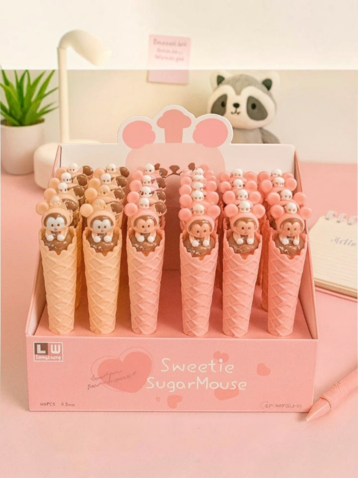 Miso station Mickey ice cream pens in a display box featuring cute mouse-shaped toppers and waffle cone barrels.