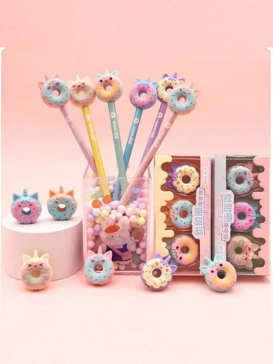 Miso station donut erasers in pastel colours with cute unicorn horn details, displayed with matching pencils.