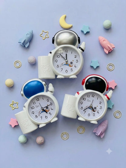 Astronaut alarm clock with pen holder