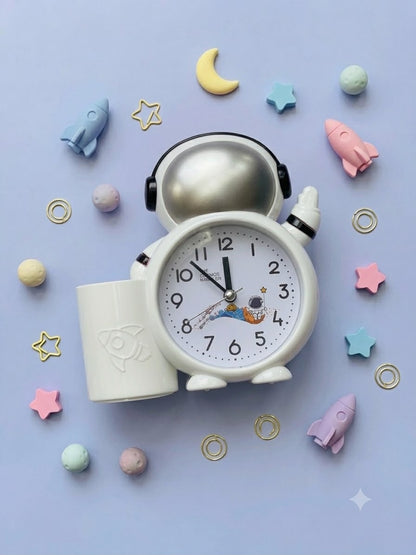 Astronaut alarm clock with pen holder