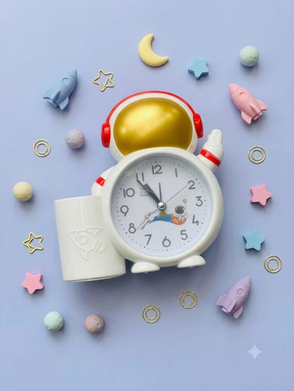 Astronaut alarm clock with pen holder
