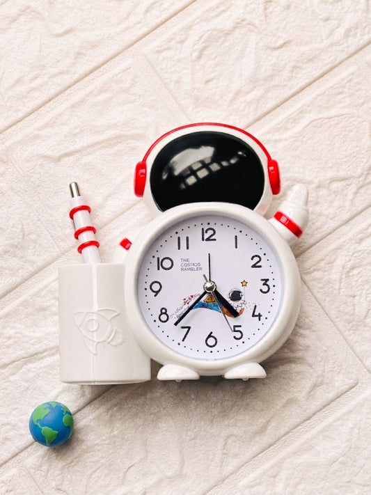 Astronaut alarm clock with pen holder