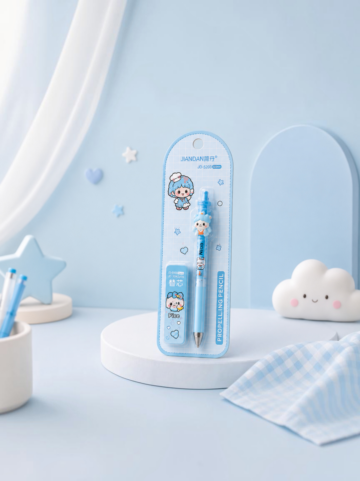 Miso station kawaii muppet doll mechanical pencil with refill leads in blue packaging on a pastel desk setting