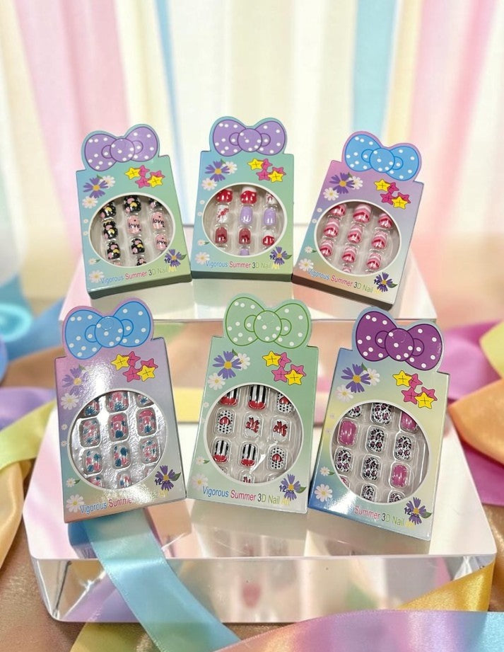 Miso station Vigorous Summer 3D press-on nail sets in various vibrant patterns and floral motifs in bow-shaped boxes.