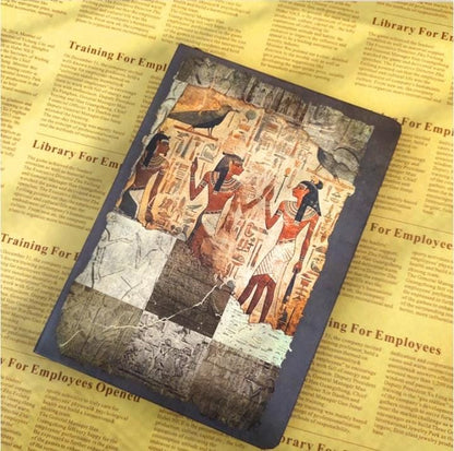 Miso station Ancient Egyptian themed journal with a textured cover featuring pharaonic figures and hieroglyphics.