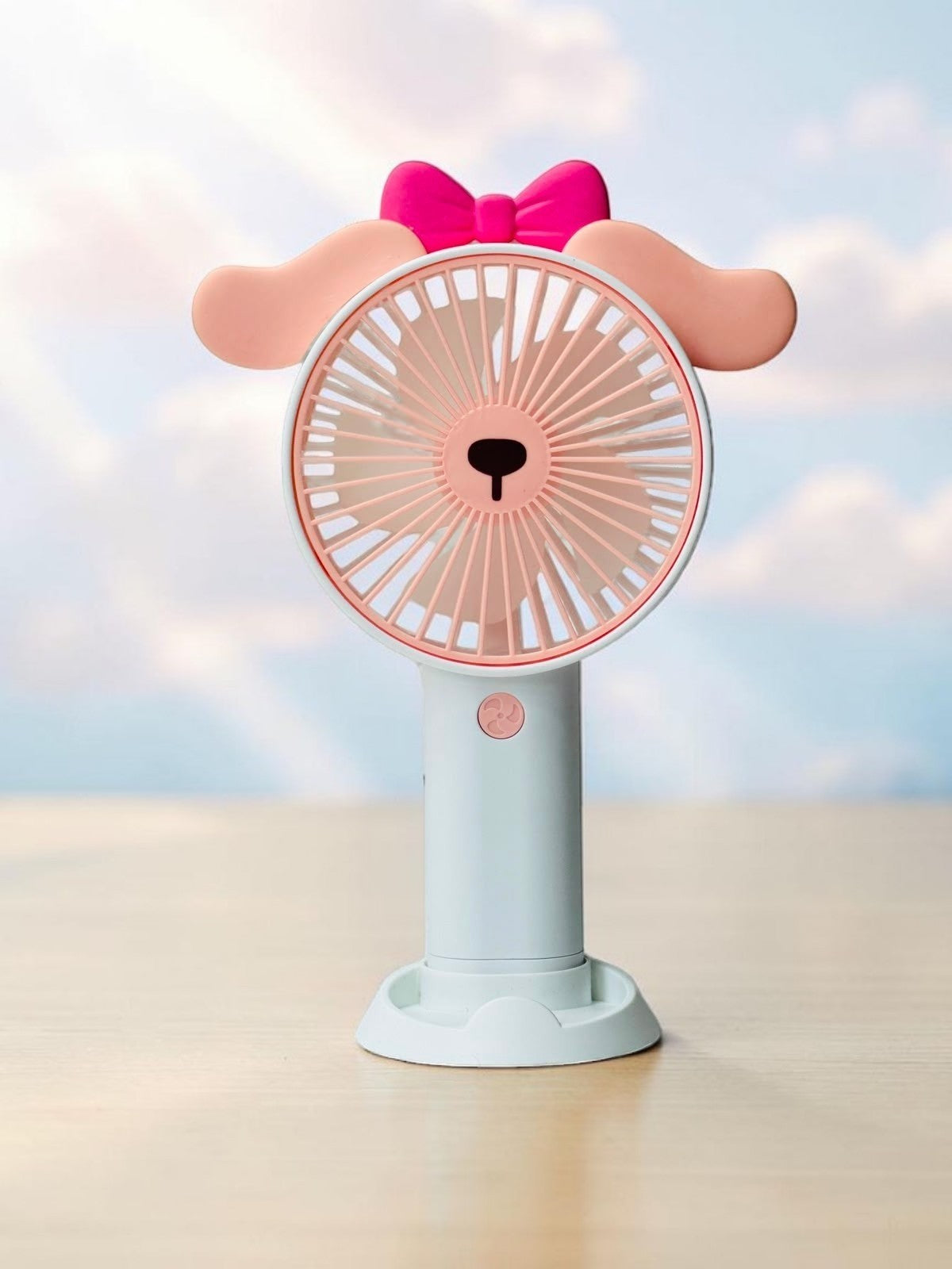 Miso station portable handheld desk fan with cute animal ears, pink bow, and integrated phone stand base