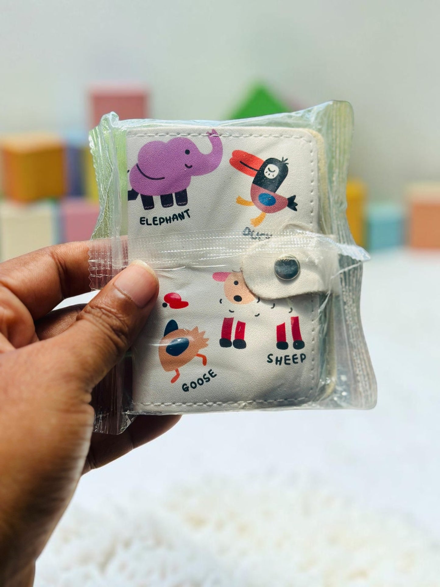 Miso station small folding wallet for kids featuring colorful elephant, goose, and sheep animal prints with snap closure