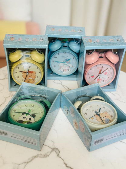 Miso station collection of five colorful twin-bell analog alarm clocks with cute animal illustrations in boxes