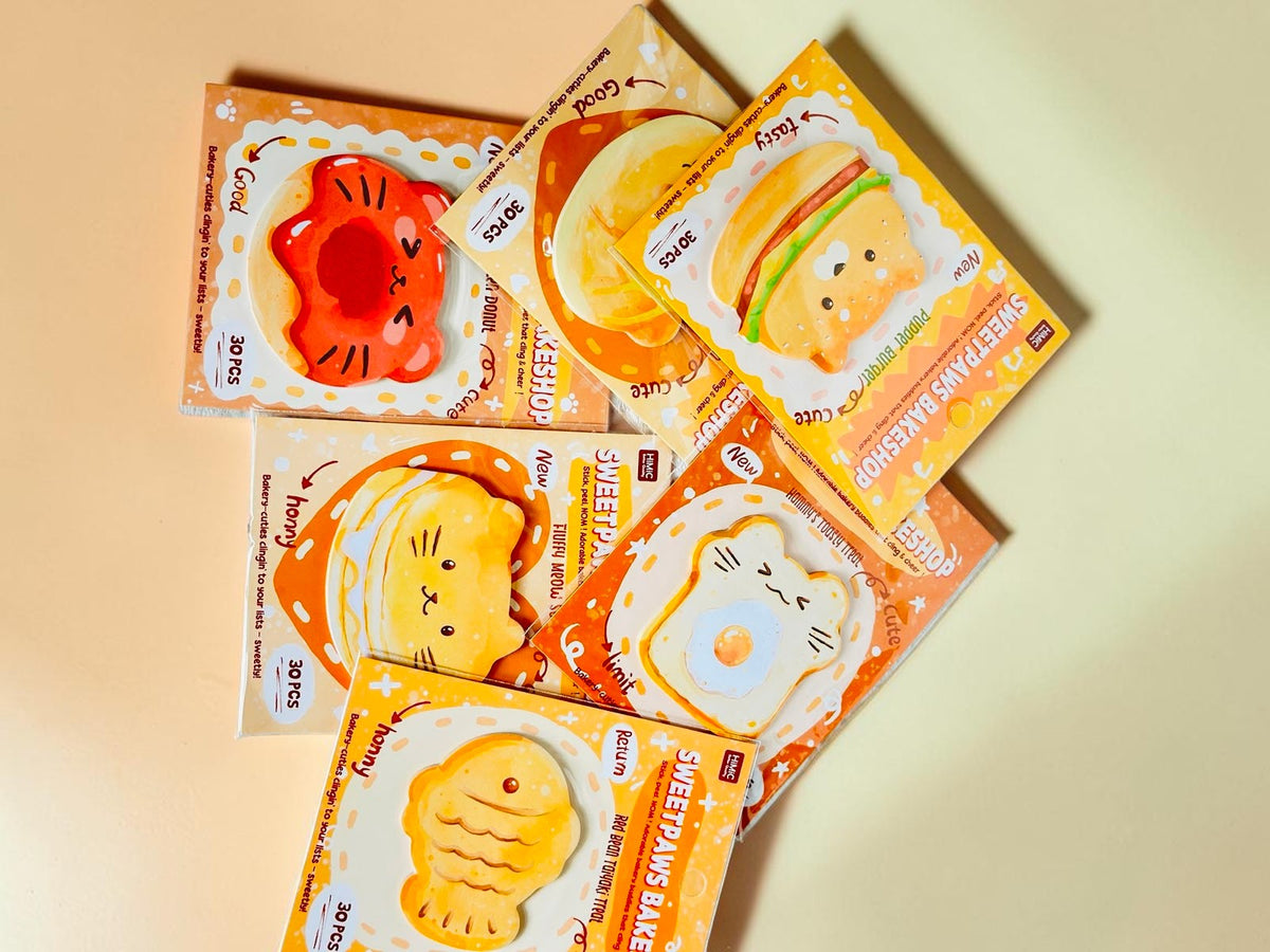 Miso station Sweetpaws Bakeshop die-cut sticky notes featuring cute bakery-themed animal and food illustrations.