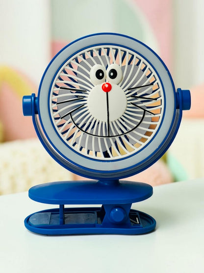 Miso station blue character clip-on desk fan with a friendly face design and adjustable head for portable cooling.