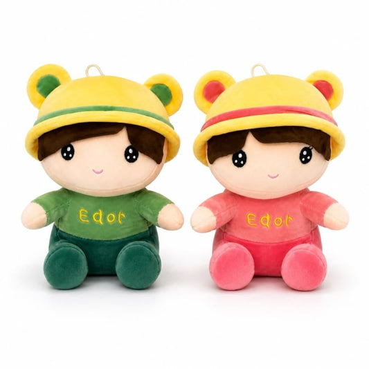Miso station plush boy dolls in green and pink outfits with yellow hats and embroidered Edot detail on soft fabric