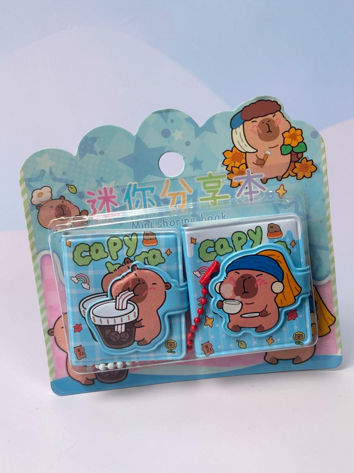 Miso station capybara themed mini notebook set with two cute blue journals featuring food illustrations