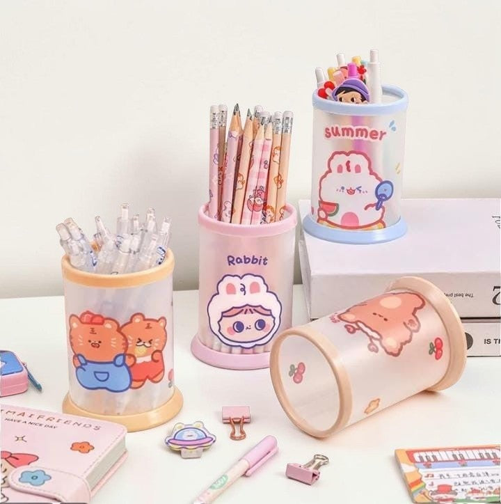 Miso station cartoon folding pen holders in various pastel colors with cute character prints on a desk
