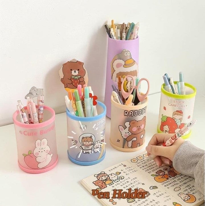 Miso station cartoon folding pen holders in assorted pastel colors with cute character prints on a desk