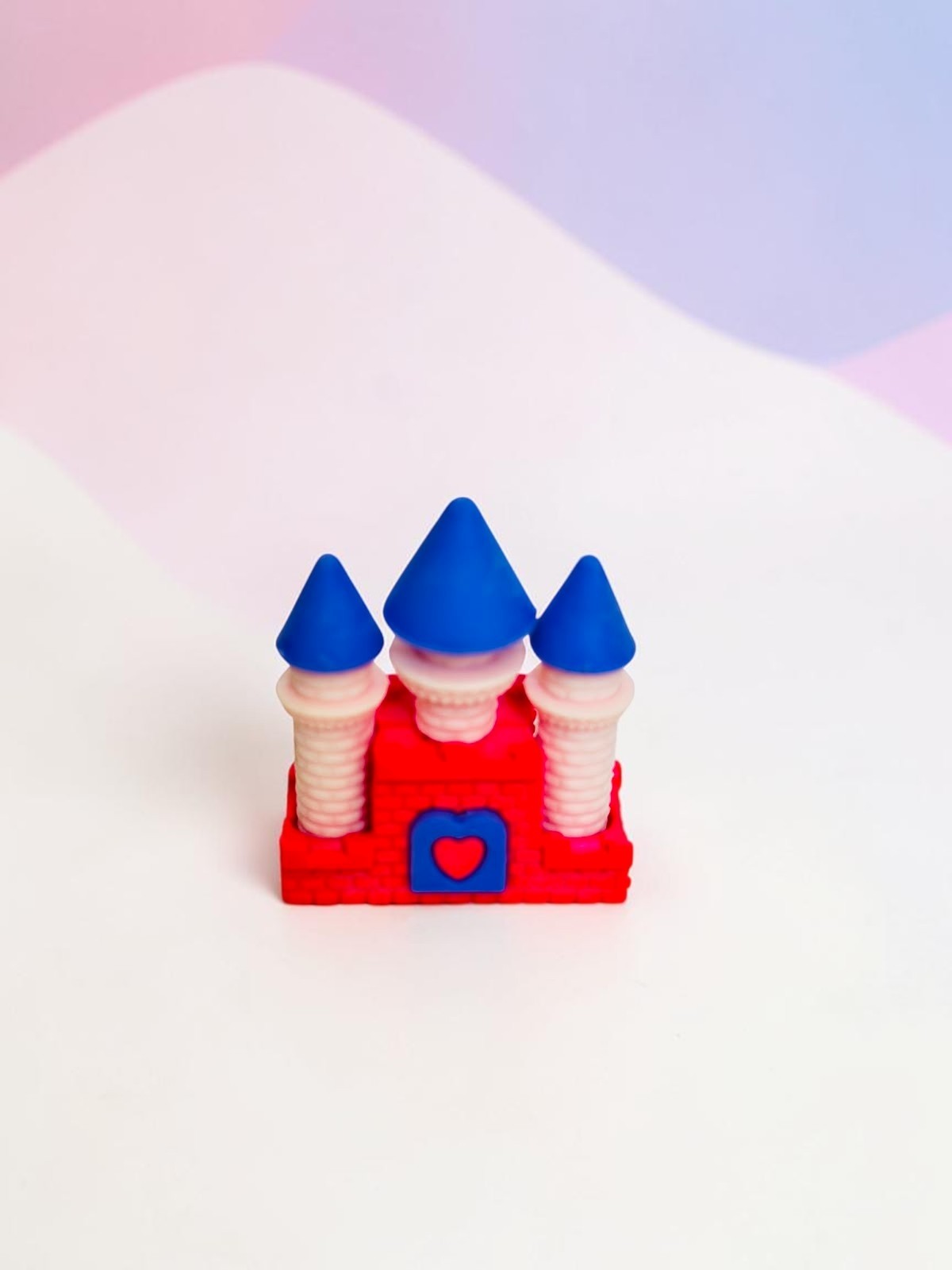 Miso station castle shaped eraser in red, pink, and blue with a heart accent for school or office stationery