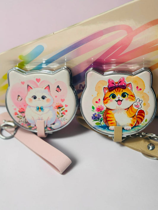 Miso station cat shaped compact mirrors with kitten illustrations, wrist straps, and keychain attachments.