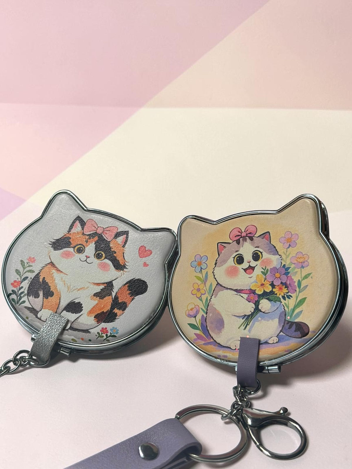 Miso station cat-shaped compact mirrors with cute kitten illustrations, metallic edges, and keychain attachments.