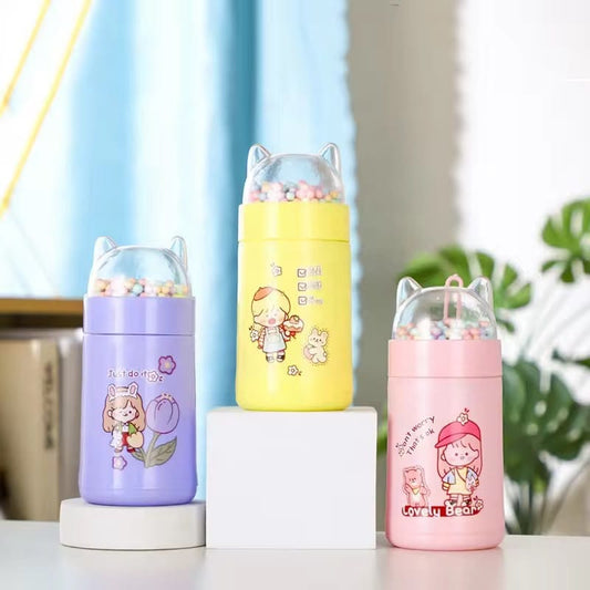 Miso station cat ear water bottles in pastel purple, yellow, and pink with character graphics and bead-filled lids.