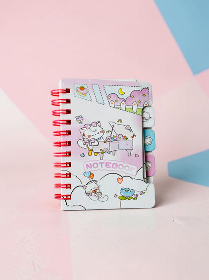 Miso station spiral bound notebook featuring cute cartoon kittens playing piano in a pastel pink garden setting