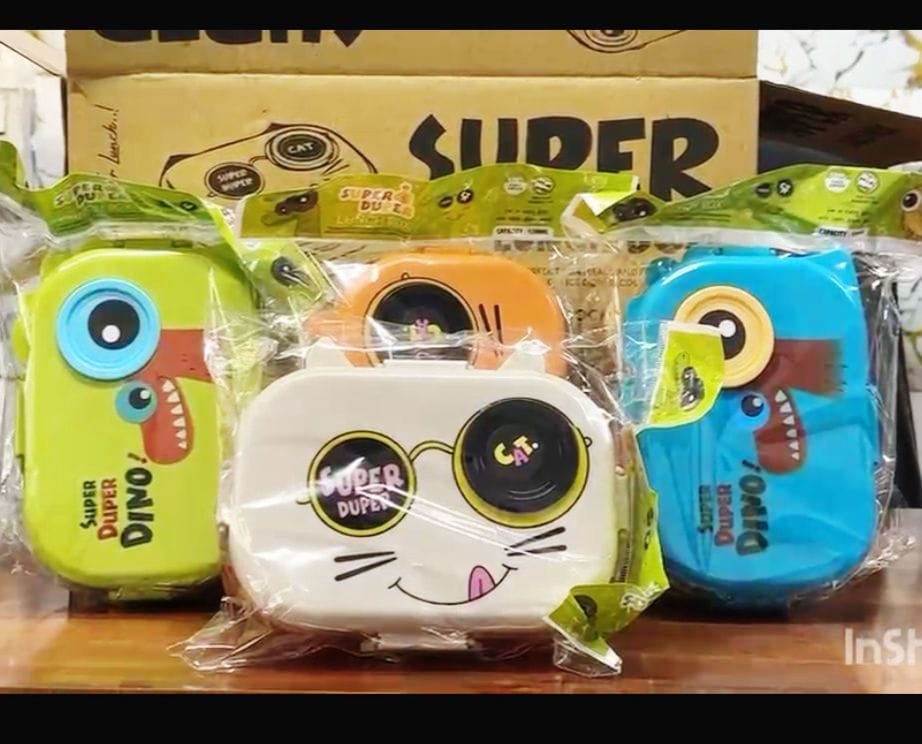Miso station multi-compartment lunch boxes featuring playful dinosaur and cat character designs in vibrant colors.