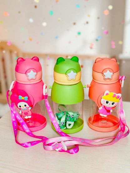 Miso station character themed water bottles in pink, green, and coral with 3D animal accents and adjustable straps.
