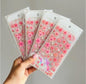 Miso station cherry blossom sticker sheets with pink sakura flowers and unicorn designs for journals and scrapbooking.