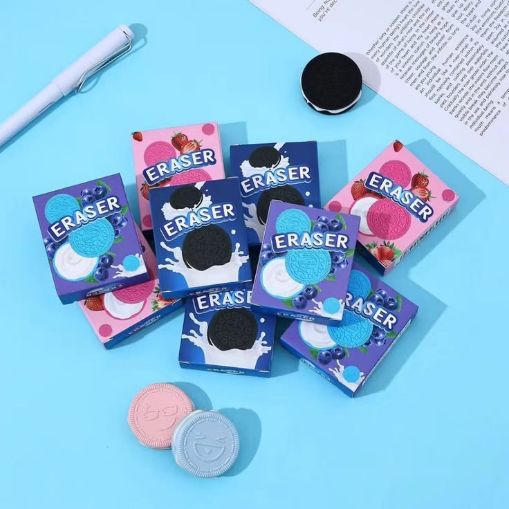 Miso station cookie shaped erasers in colorful boxes with strawberry, blueberry, and chocolate sandwich cookie designs
