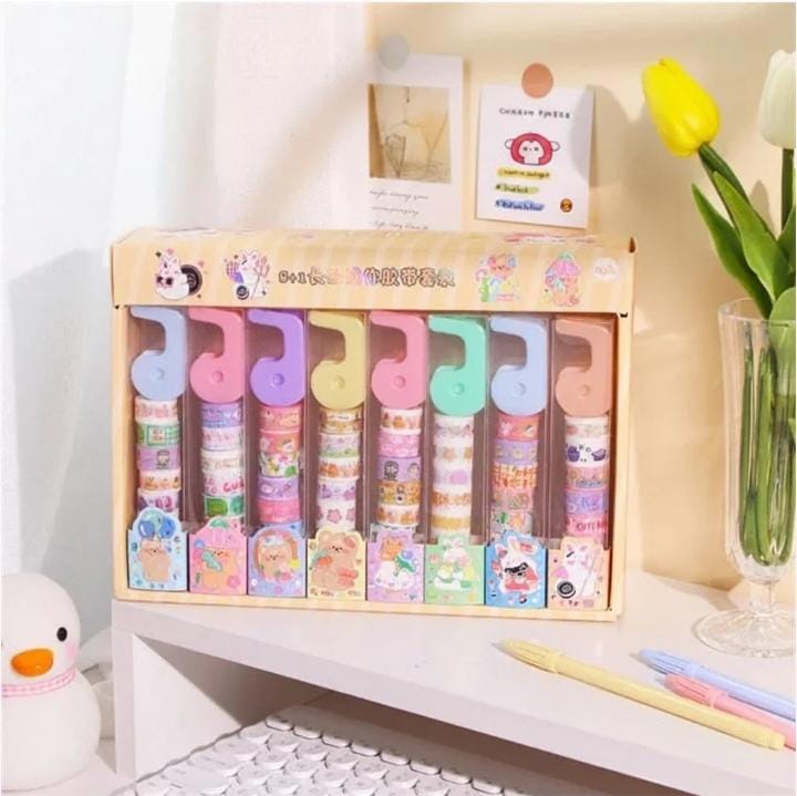 Miso station decorative washi tape set with colorful patterned rolls and a convenient plastic dispenser on a desk.