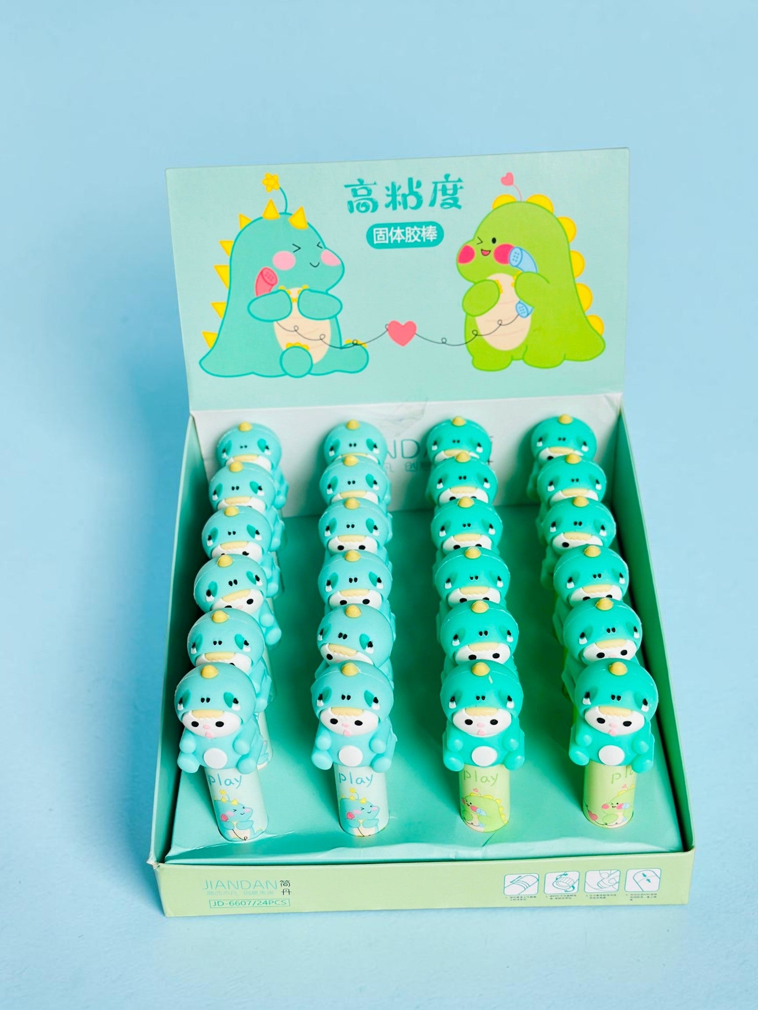 Miso station dinosaur character glue stick set in a display box with 24 pieces for school and craft projects