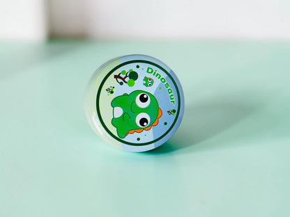 Miso station green dinosaur themed double hole pencil sharpener with a compact, rounded design for school stationery.