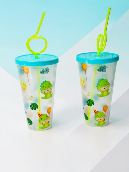Miso station dinosaur themed plastic tumblers with blue lids and lime green curly straws on a white brick background