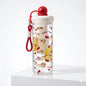 Miso station clear fruit infuser water bottle with cute dog print, red lid, and silicone carrying strap