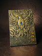Miso station vintage-style journal with an intricately embossed gold bird motif and shimmering faux gemstone accents.