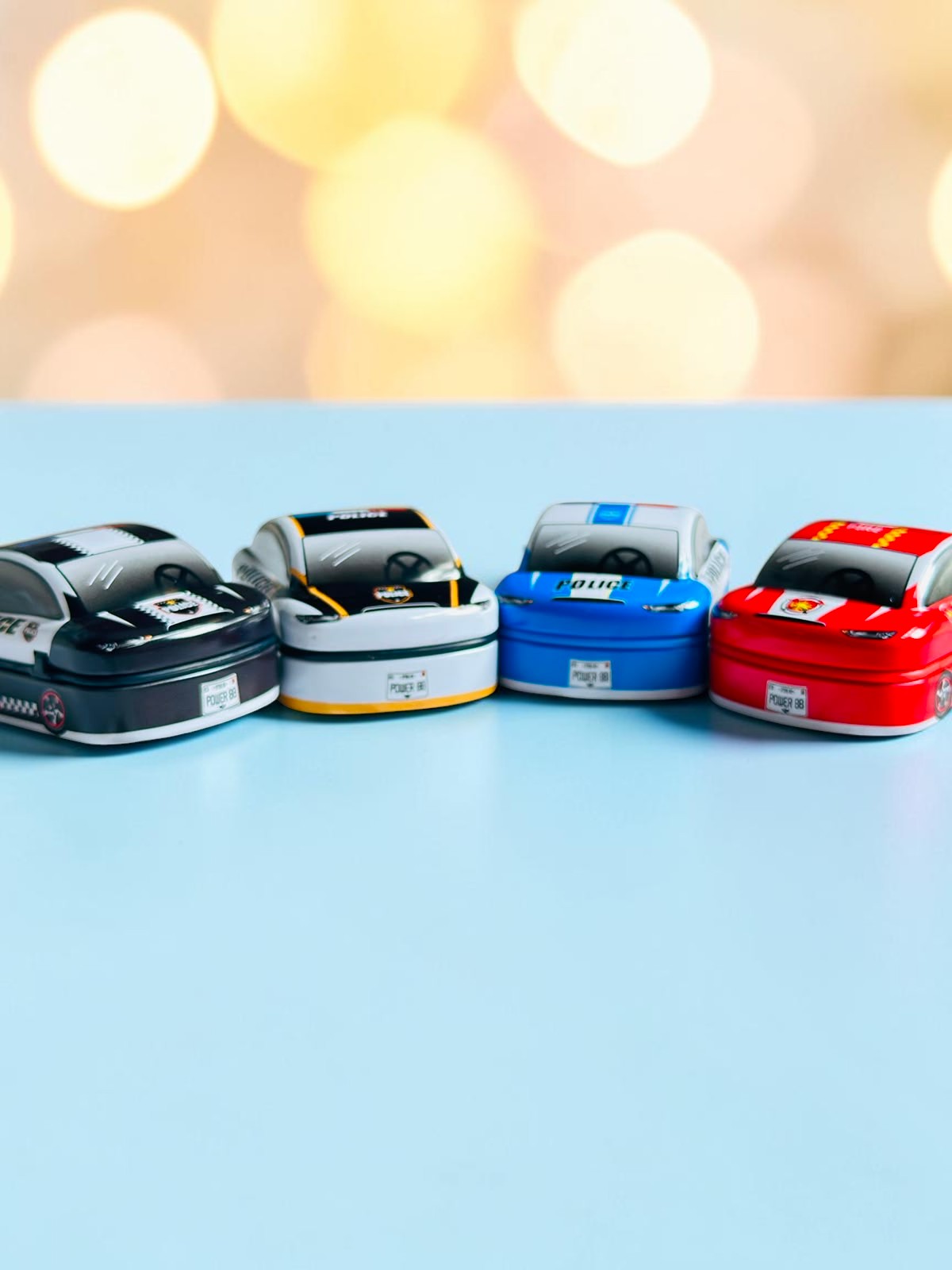 Miso station emergency vehicle metal toy car set featuring police and fire department designs in vibrant colors.