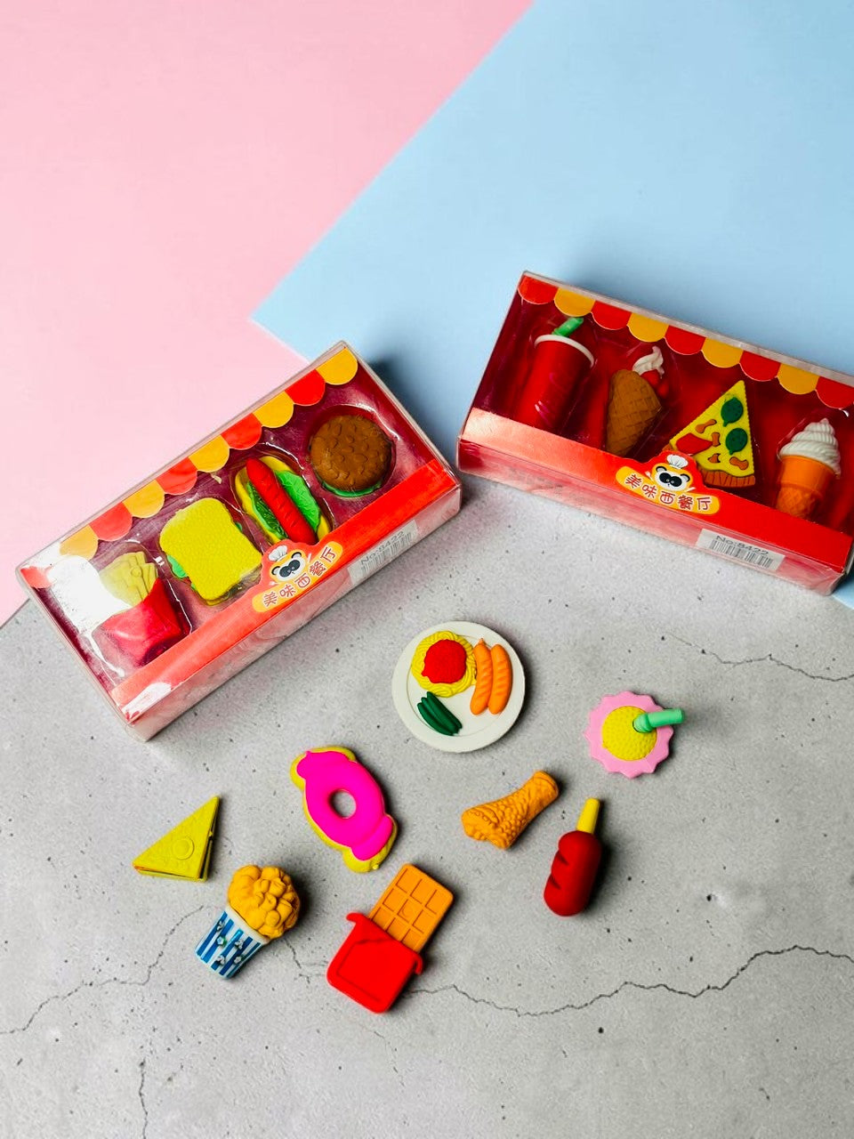 Miso station fast food themed eraser set featuring miniature rubber burgers, fries, pizza, and desserts on white