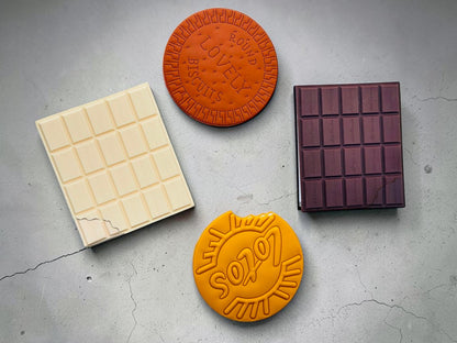 Miso station food-shaped notebooks including white chocolate, dark chocolate, and round biscuit designs in PVC.