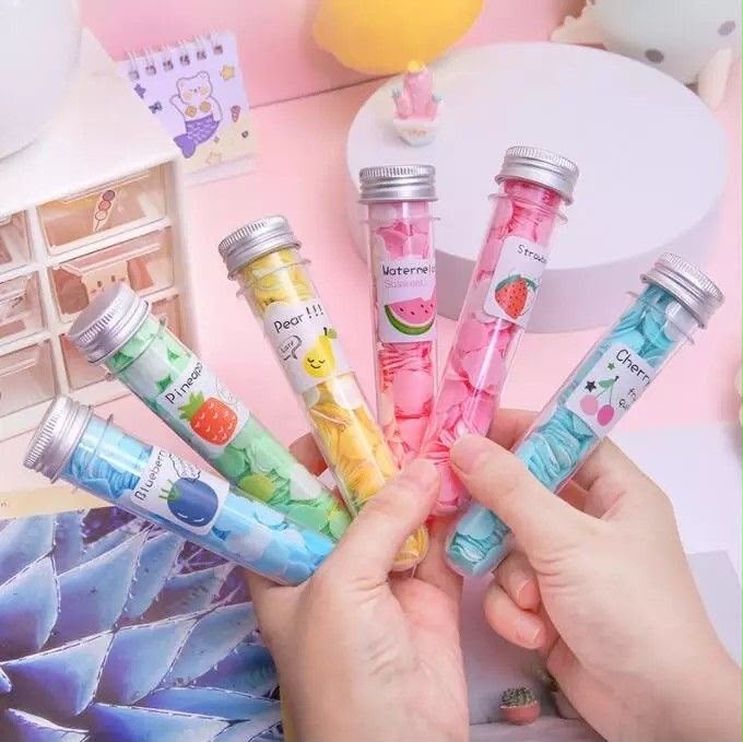 Miso station fruit scented paper soap confetti in clear test tube containers for travel-friendly handwashing.