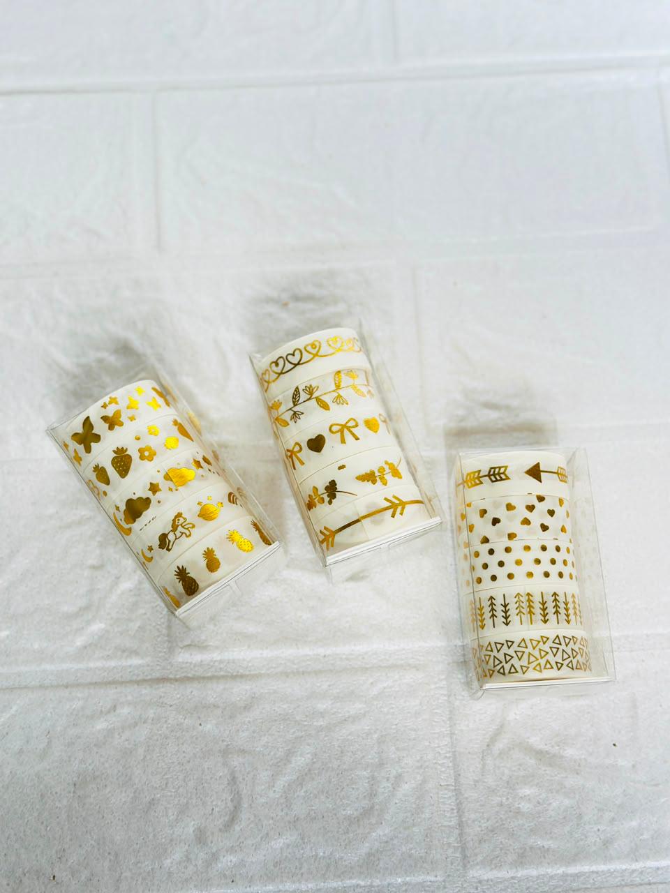Miso station Golden glow washi tape set featuring white rolls with intricate metallic gold patterns in clear packaging