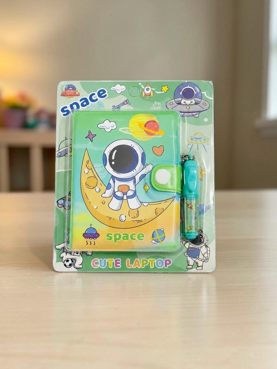 Miso station green space-themed notebook with astronaut on moon design and matching pen in retail packaging