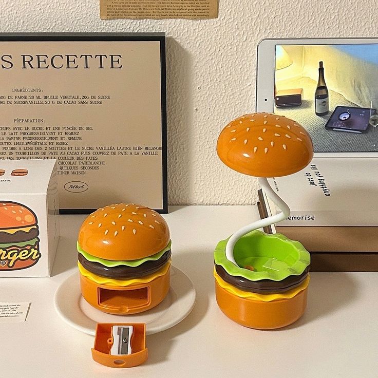 Miso station hamburger shaped desk lamp with flexible neck and integrated pencil sharpener on a white desk