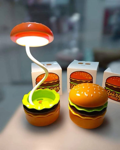 Miso station hamburger shaped LED desk lamp with flexible neck and built-in pencil sharpener on a white surface
