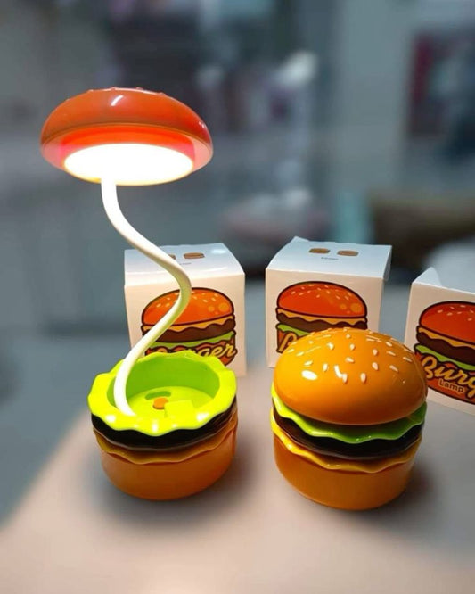 Miso station hamburger shaped LED desk lamp with flexible neck and built-in pencil sharpener on a white surface