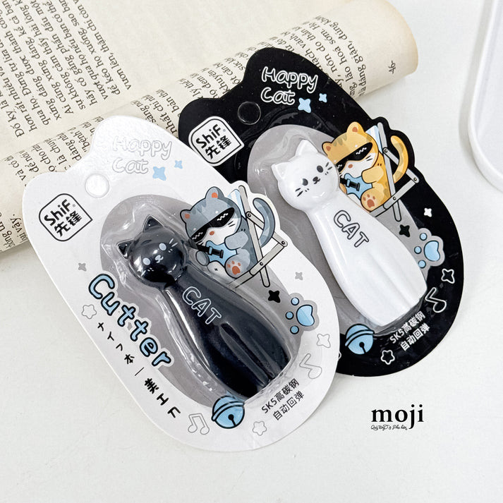 Miso station Happy Cat retractable utility cutters in black and white with ergonomic cat-shaped bodies and sharp blades