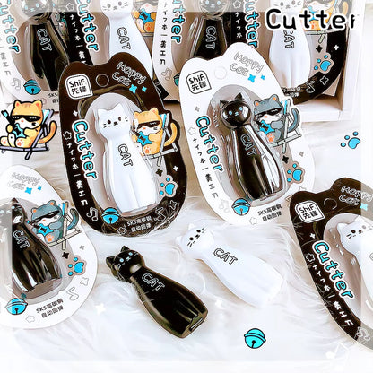 Miso station Happy Cat retractable utility cutters in black and white with ergonomic cat-shaped designs.