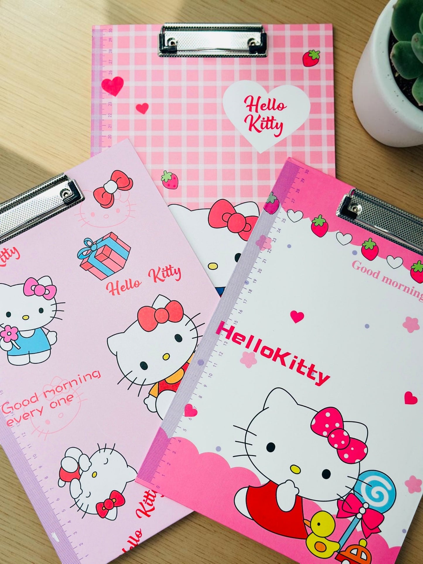 Miso station Hello Kitty decorative clipboards with metal clips, side rulers, and pink character-themed designs.