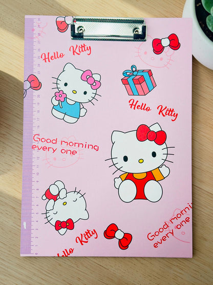 Miso station Hello Kitty pink clipboard with a sturdy metal clip and integrated side ruler for school or office use.