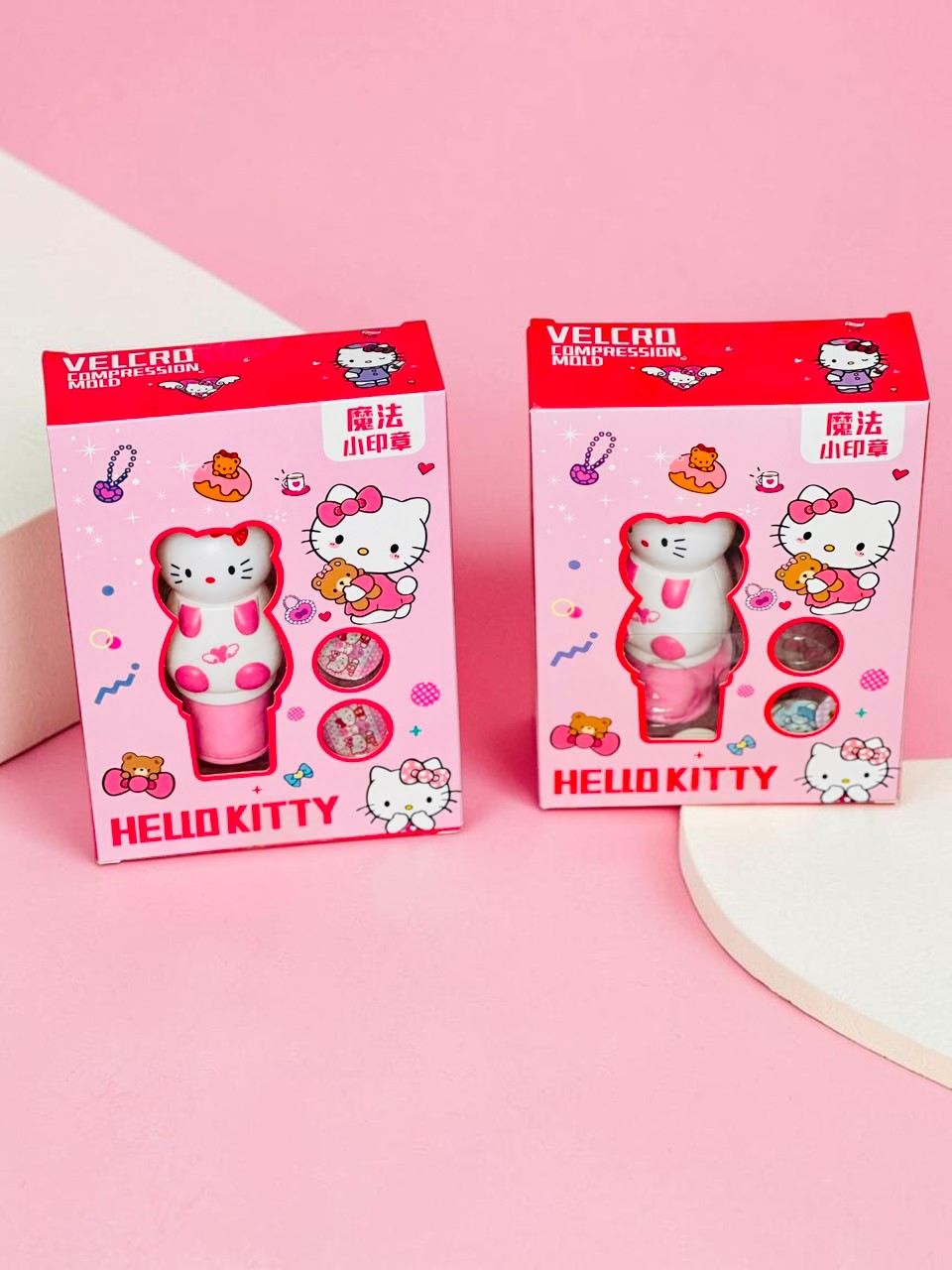Miso station Hello Kitty compression mold stamp sets in pink and white boxes with interchangeable stamp designs.