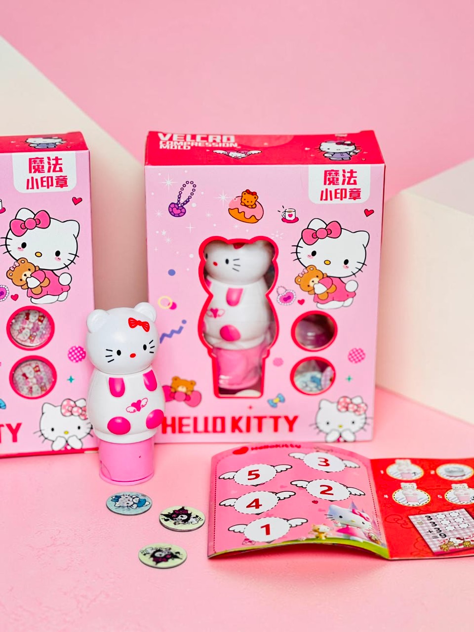 Miso station Hello Kitty compression mold stamp set with pink and white tool, interchangeable discs, and gift box.